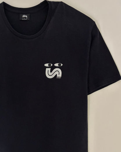 〈STUSSY〉 Face Logo Back Print T-Shirt