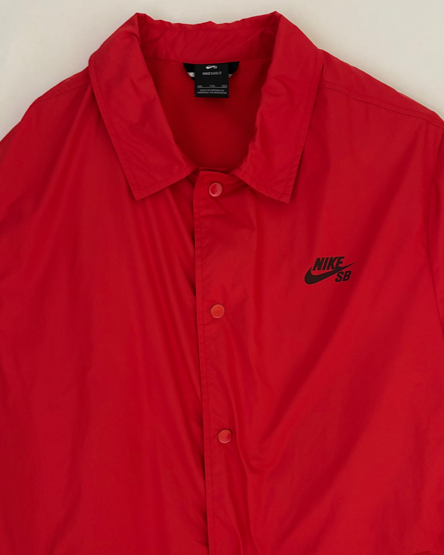 〈NIKE SB〉 Shield Coaches Jacket Red